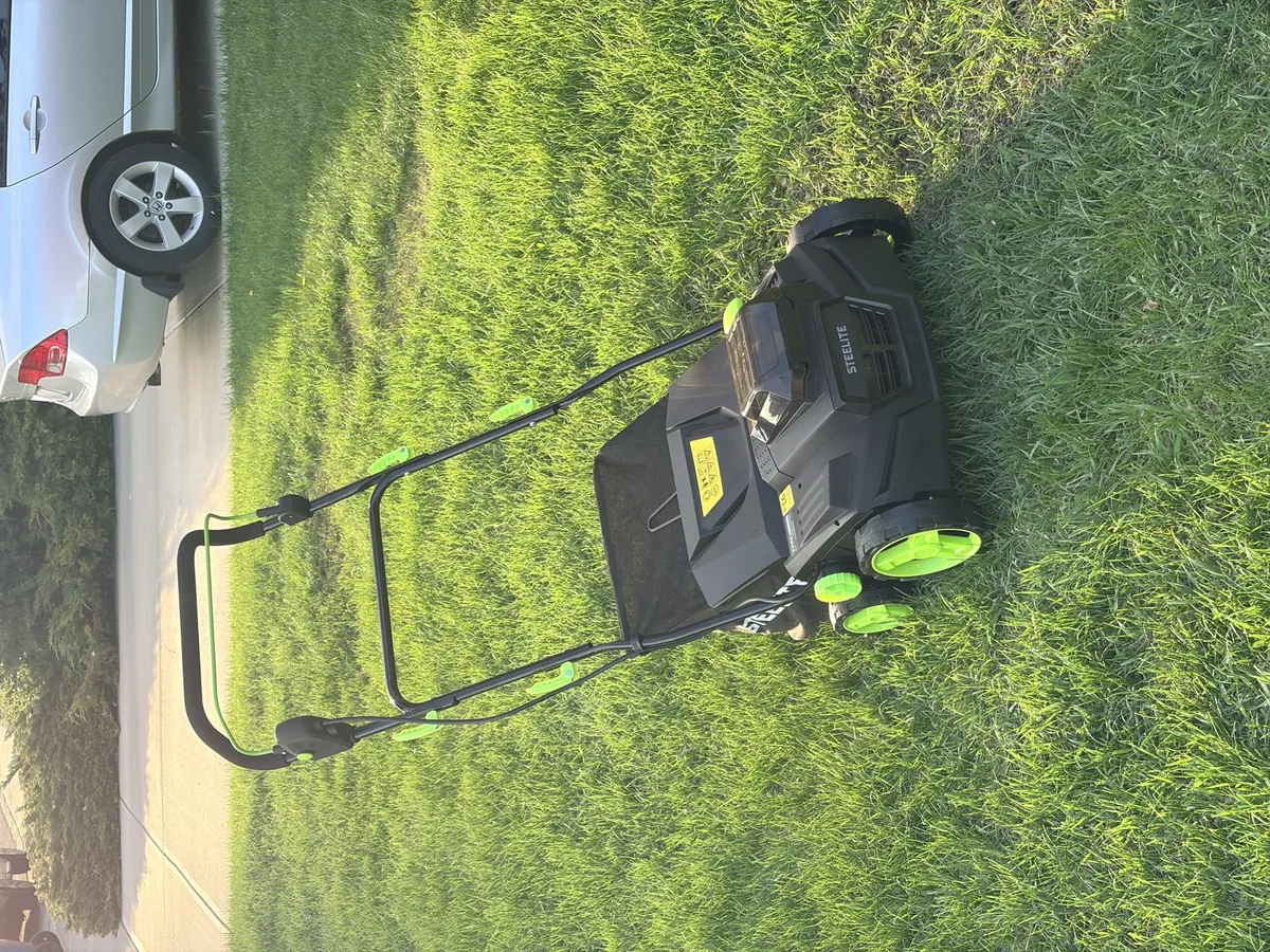 Lawn aerator on green grass Calgary