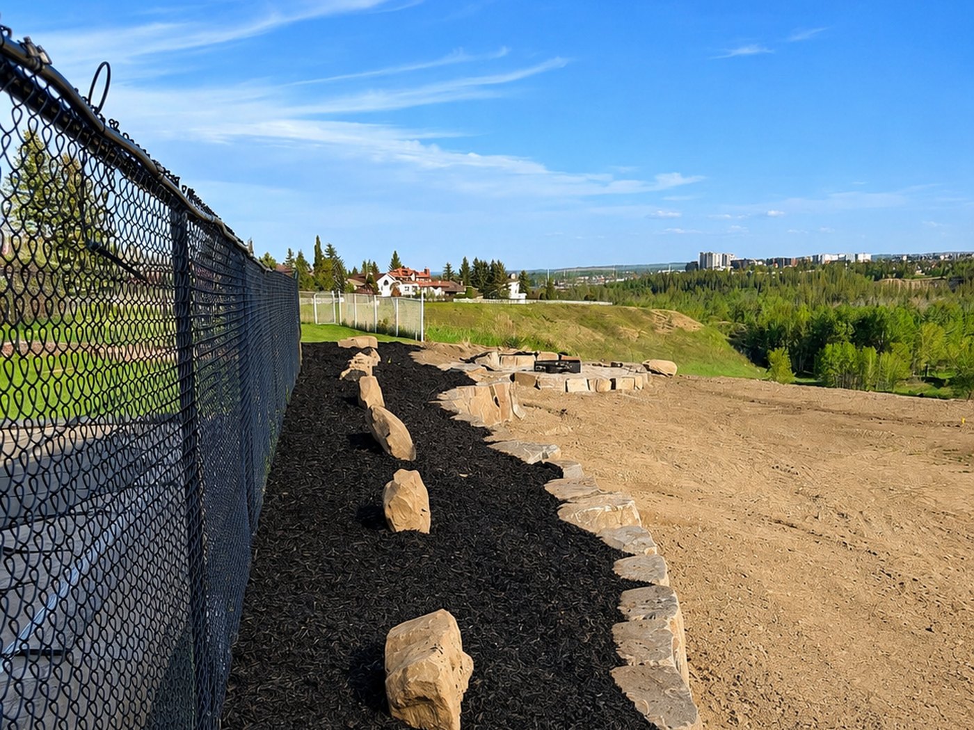 Landscaping with mulch and stone — Calgary